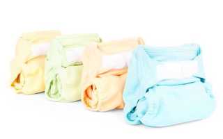 Как надеть подгузник новорождённому: инструкция и лайфхаки 2025